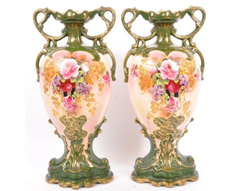 A pair of 19th century Victorian Staffordshire, England twin handles vases. Green and beige colourway with central cartouche 