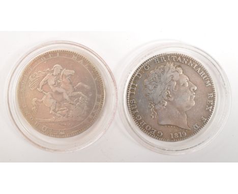 Two early 19th century George III 1819 and 1820 925 silver crown coins.&nbsp;The obverse shows a laureate head portrait of Ge