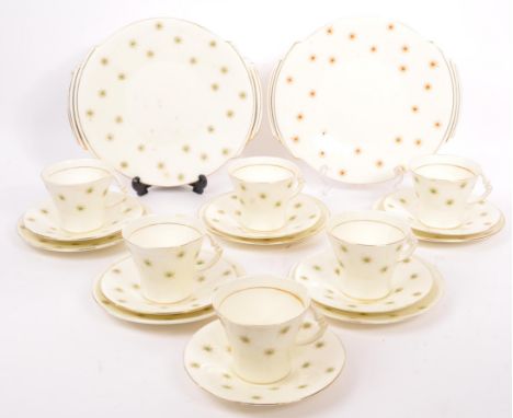 An English fine bone china 'Star of Eve' pattern tea service set by Royal Albert. Comprising of; six cups, six saucers, five 