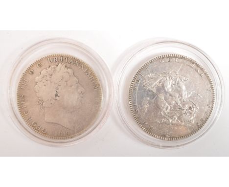 Two early 19th century George III 1818 and 1819 925 silver crown coins. The obverse shows a laureate head portrait of George 