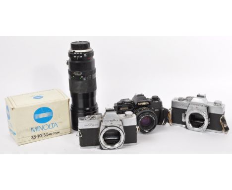 A collection of vintage 20th century 35mm cameras and accessories. The lot to include a Minolta 35-70mm F. 3.5 MD Zoom lens (