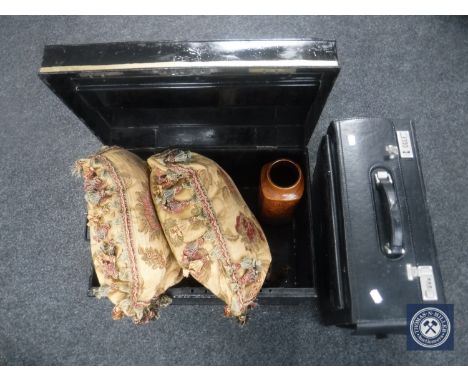 A leather doctor's bag, tin trunk containing two floral cushions and a West German vase 