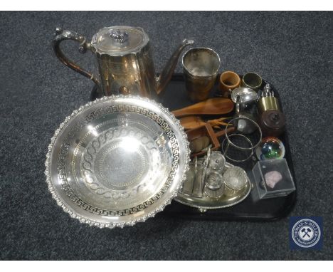 A tray containing a horn and silver plated beaker, silver plated teapot and comport, napkin rings, lidded treen pot etc