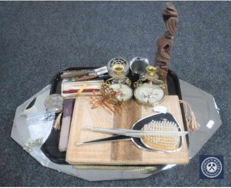 An early 20th century frameless bevelled mirror together with a tray containing cut throat razor, plated spoons, pen, automob