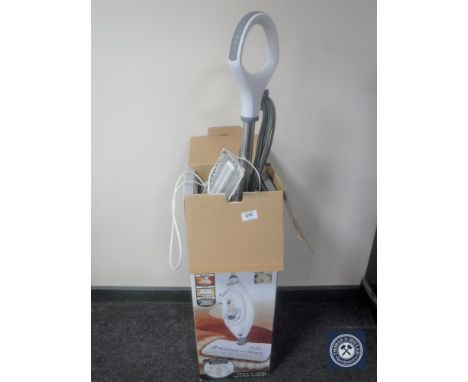 A Shark Lift Away steam mop and a lamp