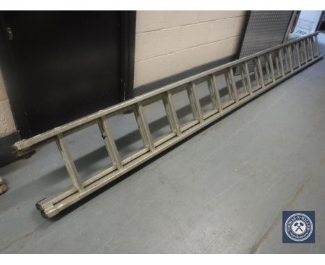 An aluminium double extension ladder  