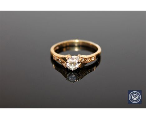 An 18ct gold diamond solitaire ring, approximately 0.4ct.