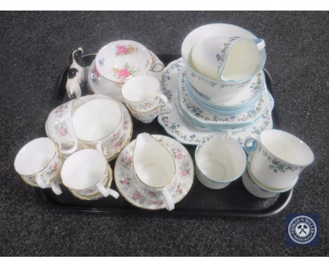 A tray containing a Beswick figure of a Spaniel, seventeen pieces of Minton Spring Bouquet tea china, part Gladstone china te