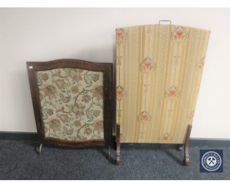A tapestry screen upholstered in an Art Nouveau fabric together with a further oak framed tapestry fire screen