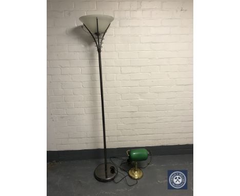 A contemporary chrome uplighter together with a banker's desk lamp