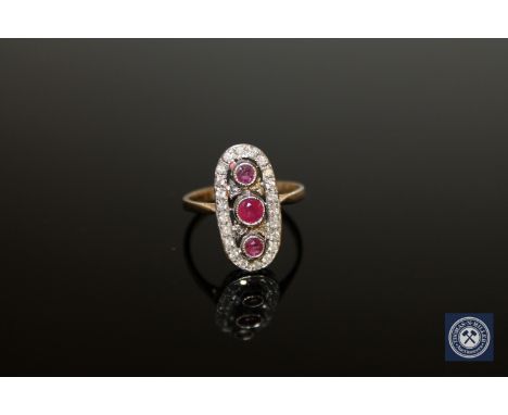 A 9ct gold ruby and diamond ring, size O