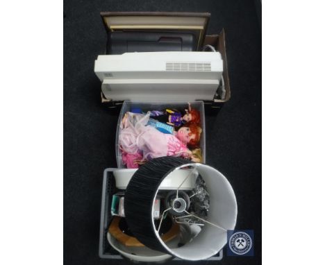 A crate of assorted dolls including Barbies, two boxes of flat bed scanner, pictures, printer, wall clock, table lamp 