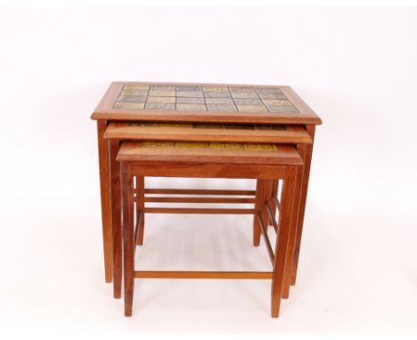 A nest of three G plan style tile top coffee tables, 56.5cm wide