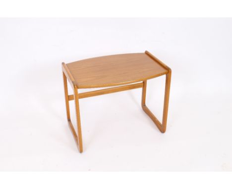 A G plan style light wood coffee table, of bow fronted form, raised on shaped supports, 61cm wide
