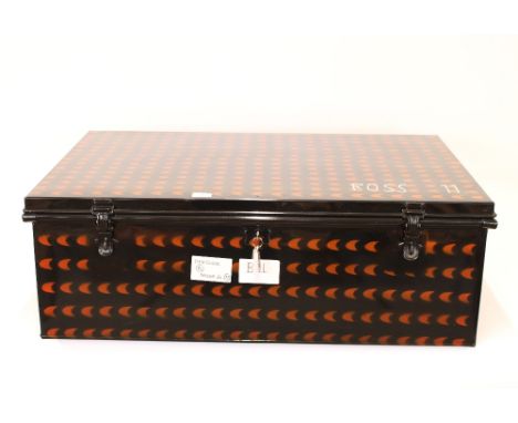 A metal travelling trunk, 91cm wide x 61cm deep x 32cm high