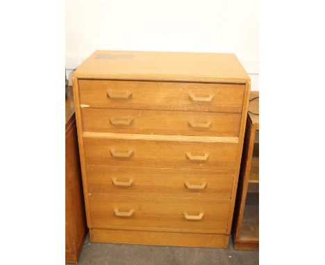 A G-plan light oak veneered chest fitted five drawers, 98cm high, 76cm wide, 45cm deep