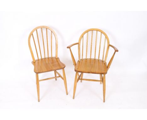 A set of four Ercol style stick back kitchen chairs, (3 standards, 1 elbow)