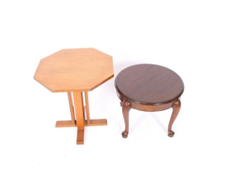 A light oak octagonal occasional table; and a circular mahogany coffee table on cabriole supports