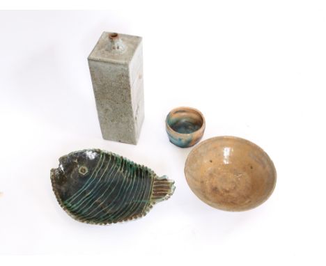 A Studio pottery lamp base, impressed JC and a number 8, 32cm high; a green Art pottery plate in the form of a Puffer fish, 3
