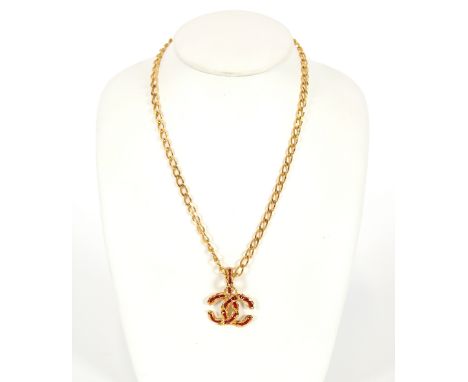 A Chanel necklace, having red enamel decoration