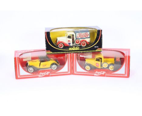 A Coca Cola brand die cast metal American truck; a similar coupe; and a Prestige Solido Pepsi Cola delivery truck, (all boxed