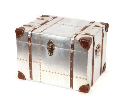 An aluminium, leather and stud decorated trunk, 44cm wide