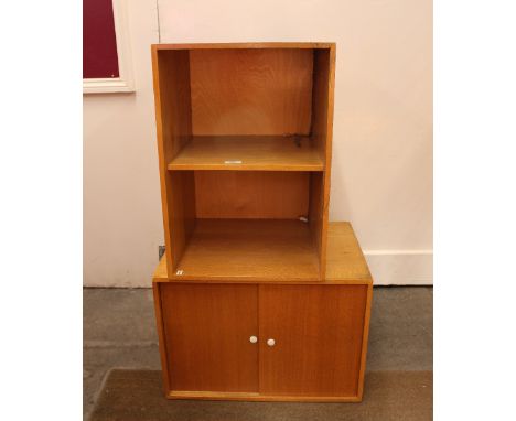 A light oak "Unix" small cabinet, enclosed by sliding doors; and another similar open fronted unit, (2)