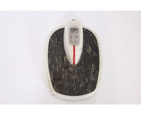 A set of Art Deco bathroom scales