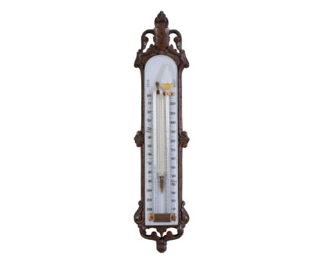  A rare Victorian carved oak and opaque glass maximum/minimum thermometer Unsigned, third quarter of the 19th century   The a