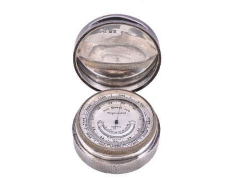  A silver cased aneroid pocket barometer with altimeter scale and thermometer Mappin, London, 1931  The 2 inch circular silve