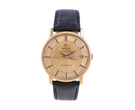  A gentleman s 18ct gold automatic chronometer calendar wristwatch Omega  Constellation  Swiss, 1960 s  The radial brushed ch