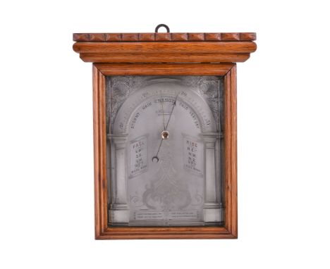  An unusual oak cased aneroid wall barometer possibly for use on a yacht Stebbing, Southampton, late 19th century  The rectan