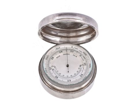  A silver cased aneroid pocket barometer with altimeter scale and thermometer Unsigned, London, 1920  The 2 inch circular sil