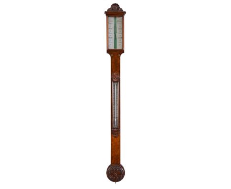 Ω A Victorian carved walnut mercury stick barometer Gargory, Birmingham, third quarter of the 19th century With scallop shell