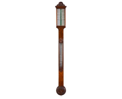 Ω A Victorian carved walnut mercury stick barometer Gargory, Birmingham, third quarter of the 19th century With scallop shell