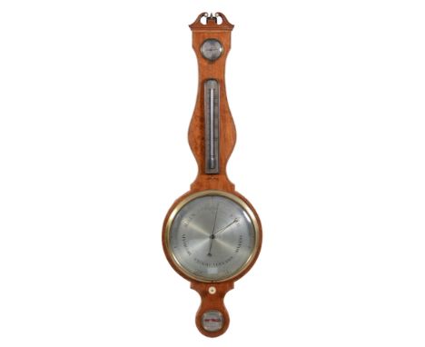 Ω A rare George III satinwood mercury wheel barometer Tagliabue and Torre, London, circa 1805 With open swan neck pediment an