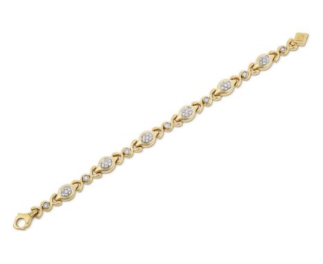 six yellow lozenge-shaped plaques pavé set with round brilliant cut diamonds alternate with seven cross motif links with a ro