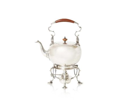 in the George II style, globular and with overhead part-wood swing handle, on conforming stand with four scroll legs and a ce