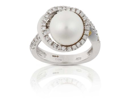 the South Sea pearl within a swirl motif border set throughout with round brilliant cut diamonds, in claw settings, to simila