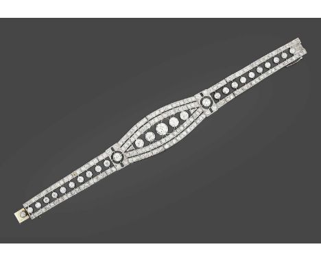 the central section comprising five graduated old cut diamonds to an openwork border, flanked by two rows of old cut diamonds