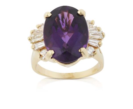 the oval cut amethyst flanked by tapered baguette and round brilliant cut diamonds, in yellow claw settings, to a tapered sho