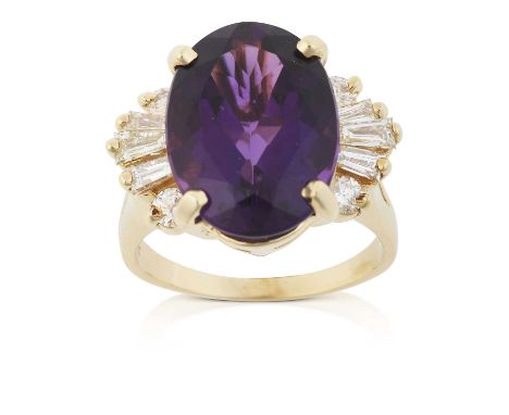 the oval cut amethyst flanked by tapered baguette and round brilliant cut diamonds, in yellow claw settings, to a tapered sho