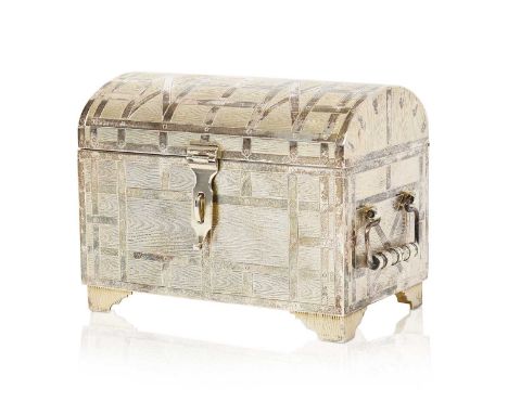 oblong and with domed cover, overall trompe l'oeil engraved to simulate wood, with two drop ring handles, with oblong latch, 