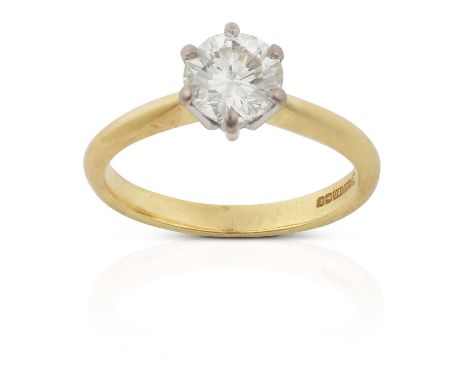 the round brilliant cut diamond in a white claw setting, to a yellow tapered shoulder plain polished shank, estimated diamond