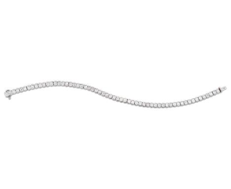 the fifty-eight round brilliant cut diamonds in rubbed over settings, total estimated diamond weight 4.95 carat approximately