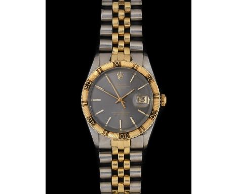 A Steel and Gold "Thunderbird" Bezel Automatic Calendar Centre Seconds Wristwatch, signed Rolex, Oyster Perpetual, Superlativ