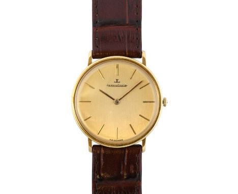 An 18 Carat Gold Wristwatch, signed Jaeger LeCoultre, 1969, manual wound lever movement signed and numbered 2211204, champagn