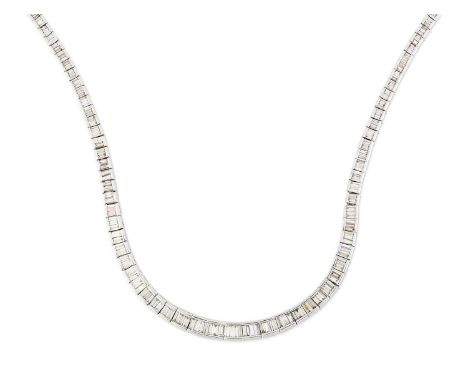 the graduated baguette cut diamonds in white channel settings, total estimated diamond weight 10.50 carat approximatelylength