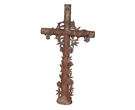 A CONTINENTAL CAST IRON ALTAR CROSS early 20th century, decorated on both sides with climbing roses, 132cm high x 71cm wide P