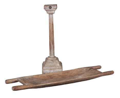 TWO PIECES OF TREEN including a shallow dish, probably 19th century, with twin handles at each end, 74cm long x 24.5cm wide, 